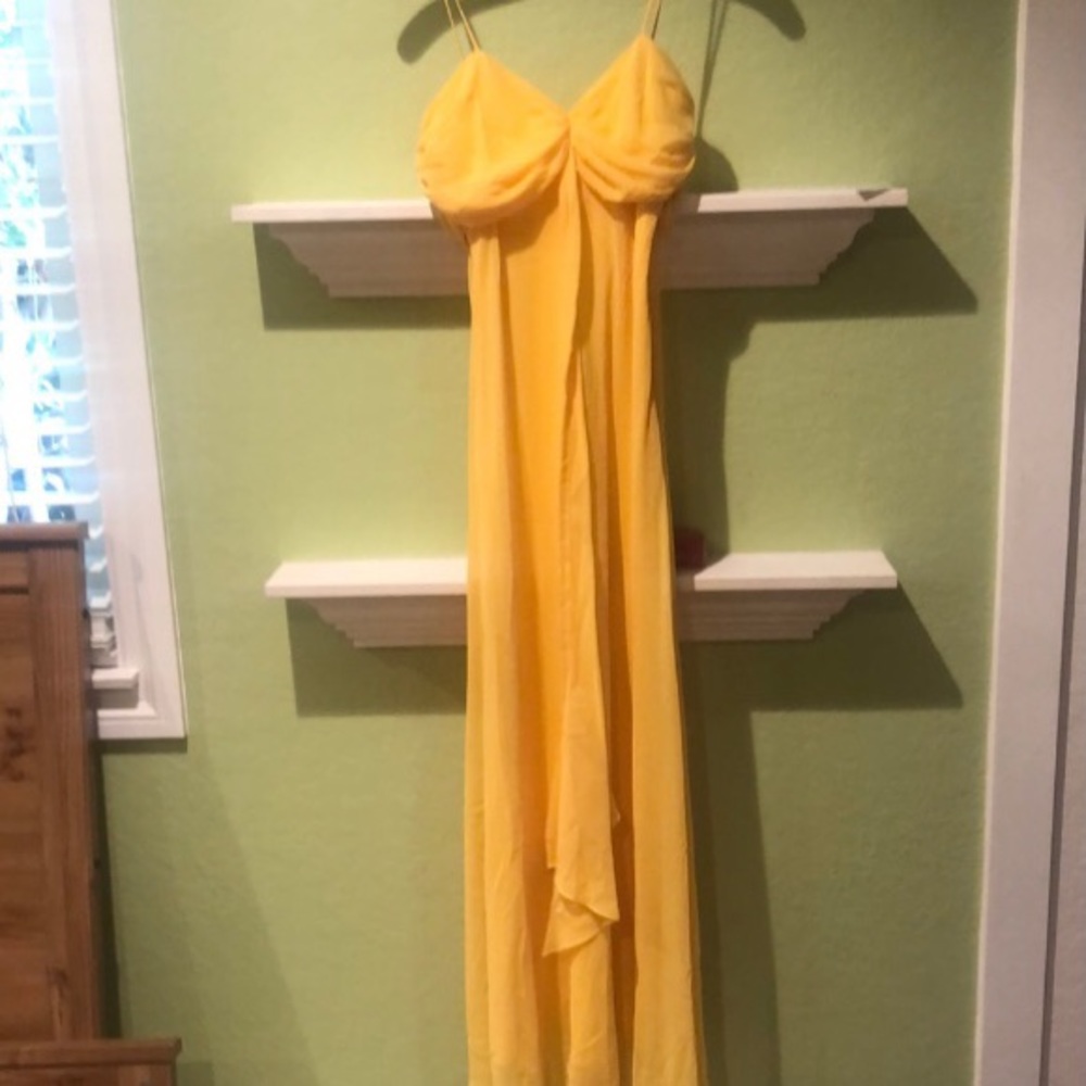 Bright beautiful yellow chiffon gown.